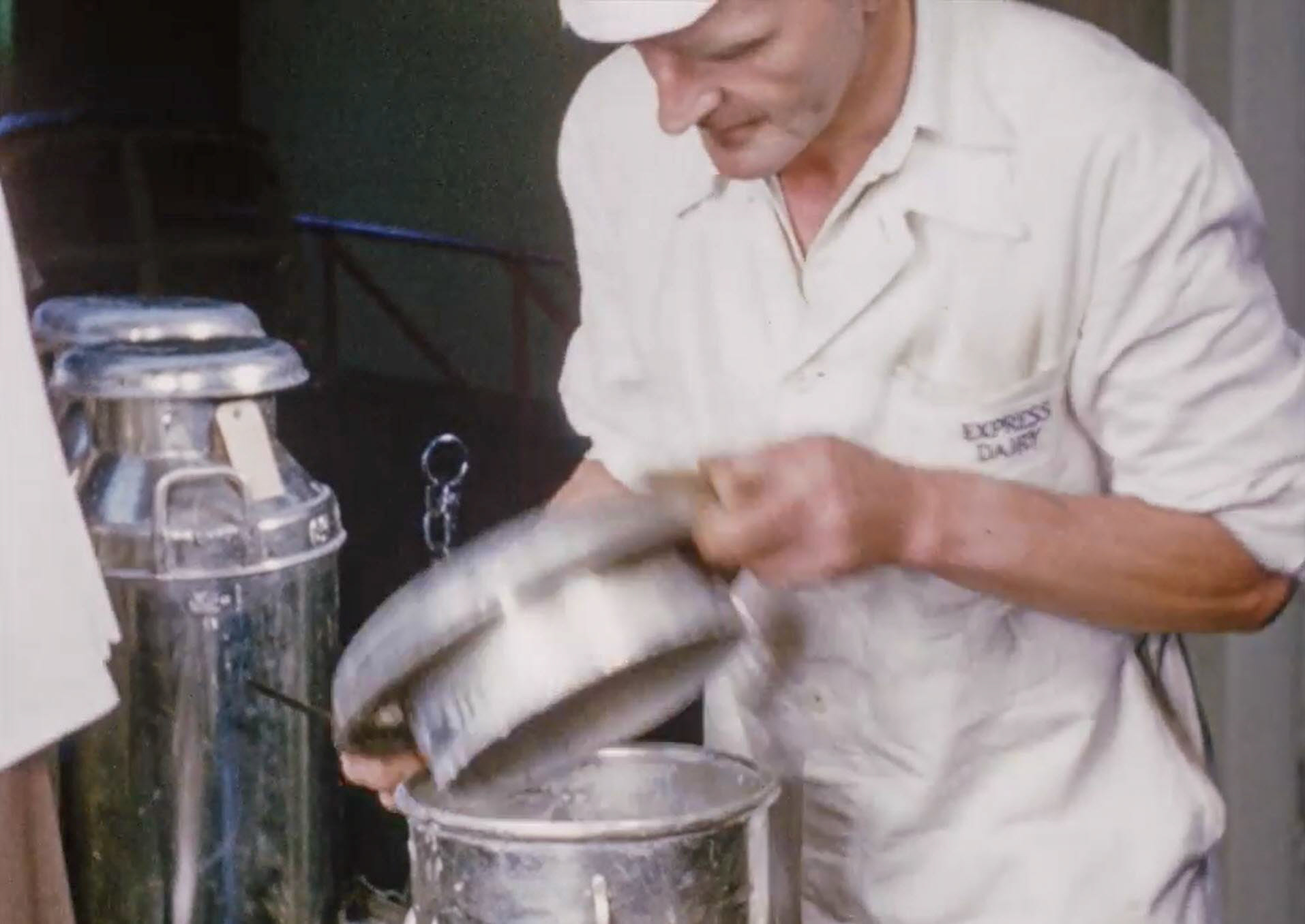 1954 Checking incoming milk for smell and laboratory sampling at Billingshurst Creamery (Stills from Express Dairy Film)