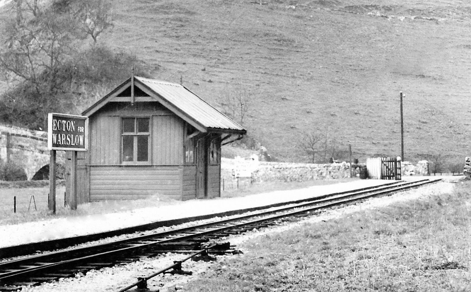 1934 Ecton station, next door to the Cheese factory. John Irish comments "I think that this was taken two months after closure, by the famous railway photographer H. C. Casserly." (Courtesy Alan Salt)