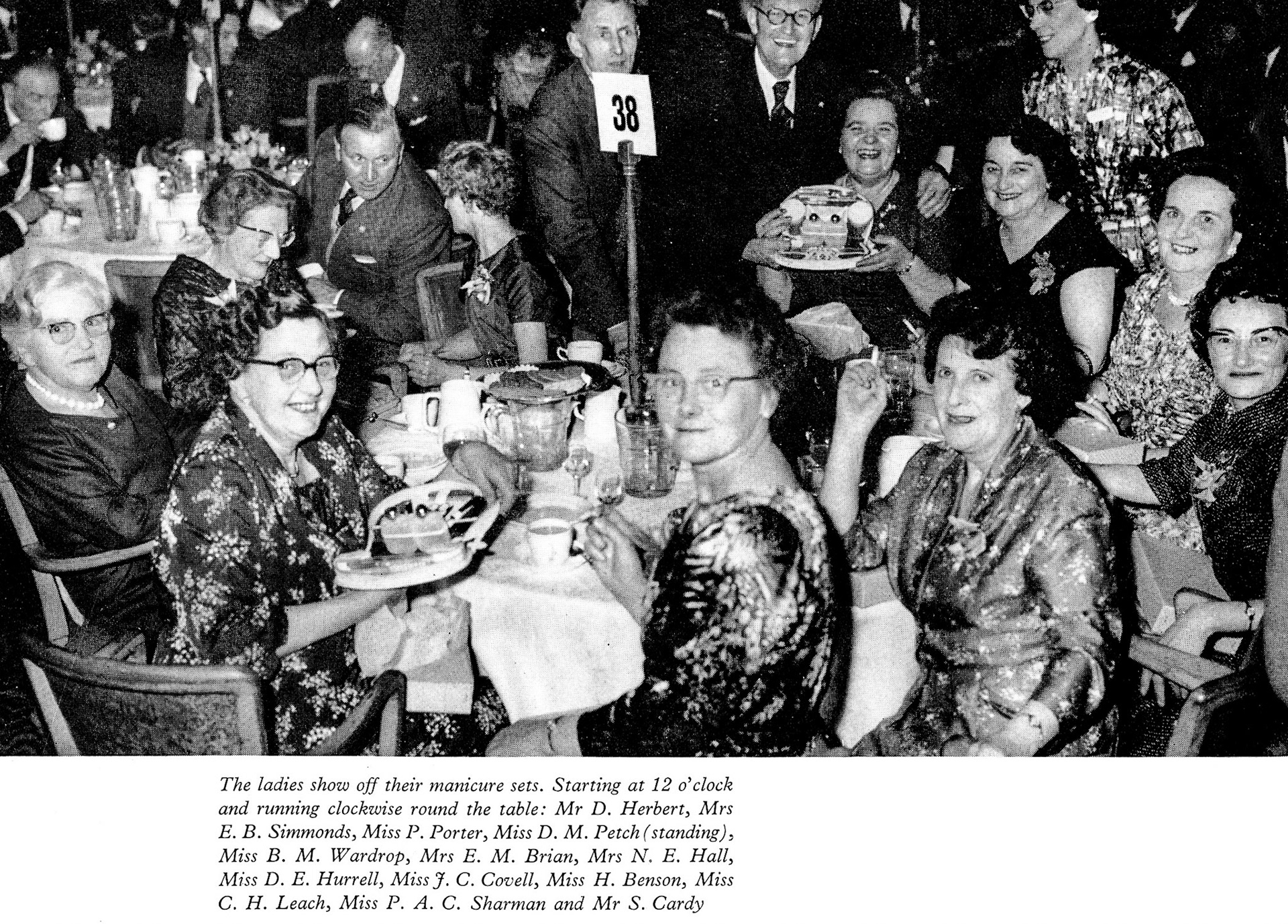 1961 Long Service Dinner at The Grosvenor Rooms- Mr D. Herbert, Mrs E.B. Simmonds (Finchley), Miss P. Porter (Chief Office), Miss D.M. Petch (Muswell Hill), Miss B.M. Wardrop (Kingsbury), Mrs E.M. Brian (Wembley Central), Mrs N.E.H Hall (Hurlingham), Miss D.E. Hurrell (Crediton), Miss J.C. Covell (Shirland Road), Miss H. Benson (Connaught Street), Miss C.H. Leach (Ealing), Miss P.A.C. Sharman (Chiswick), Mr S. Cardy (T.H. Lewis). (LSA Annual Review)