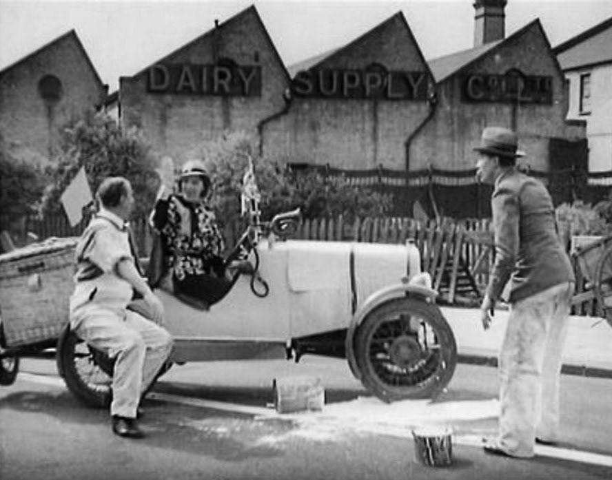 1935 Dairy Supply Company in Cumberland Avenue, Park Royal,  appears in the background of this Gracie Fields film 'Look Up &amp; Laugh' (Screengrab from Reelstreets https://share.google/JZBs9Ns7GitpJ2Wmj, courtesy Mark Amies)