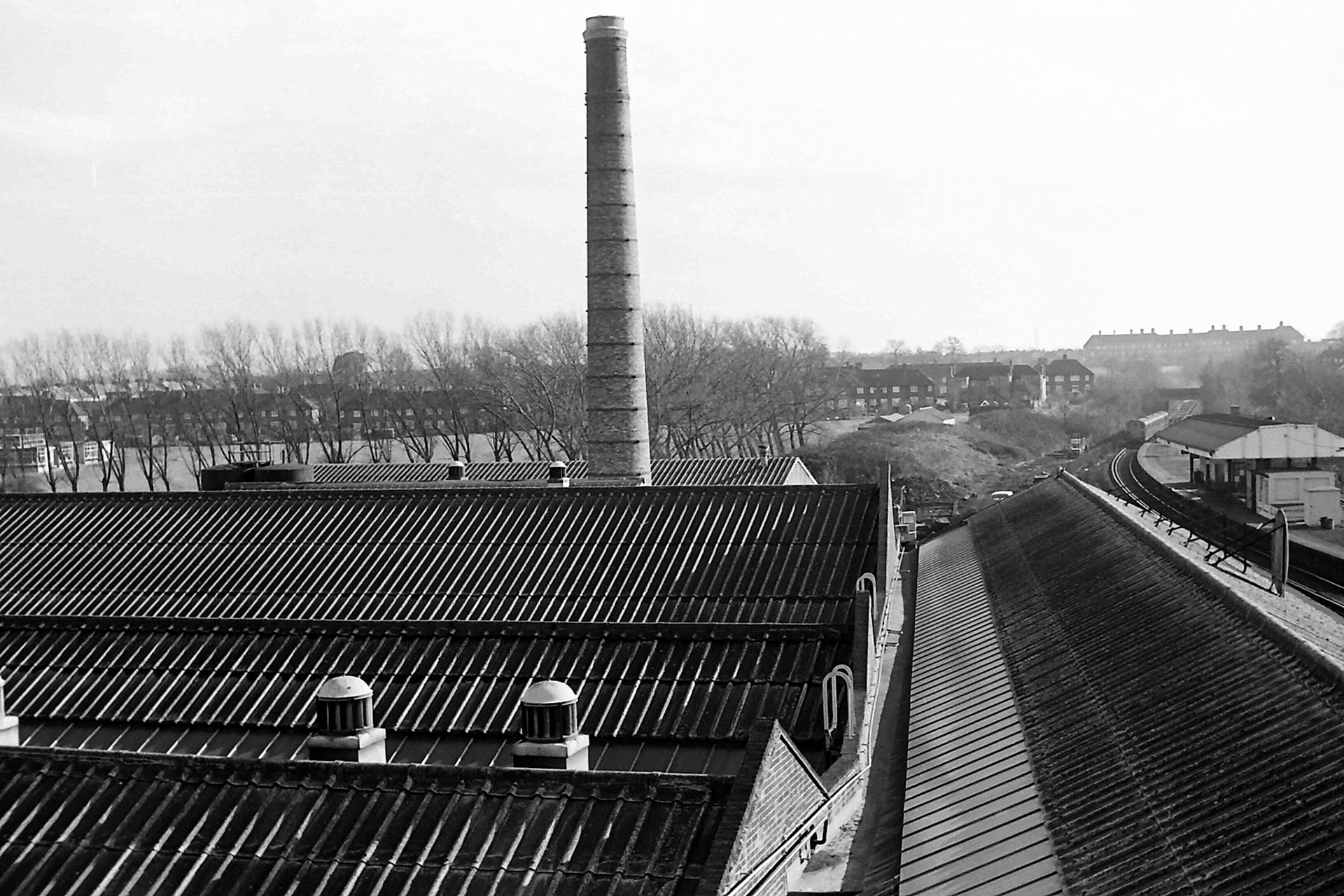 1979 View looking South from South Morden Dairy roof, with the old boiler chimney yet to be demolished. (Photographer Sam Jones)