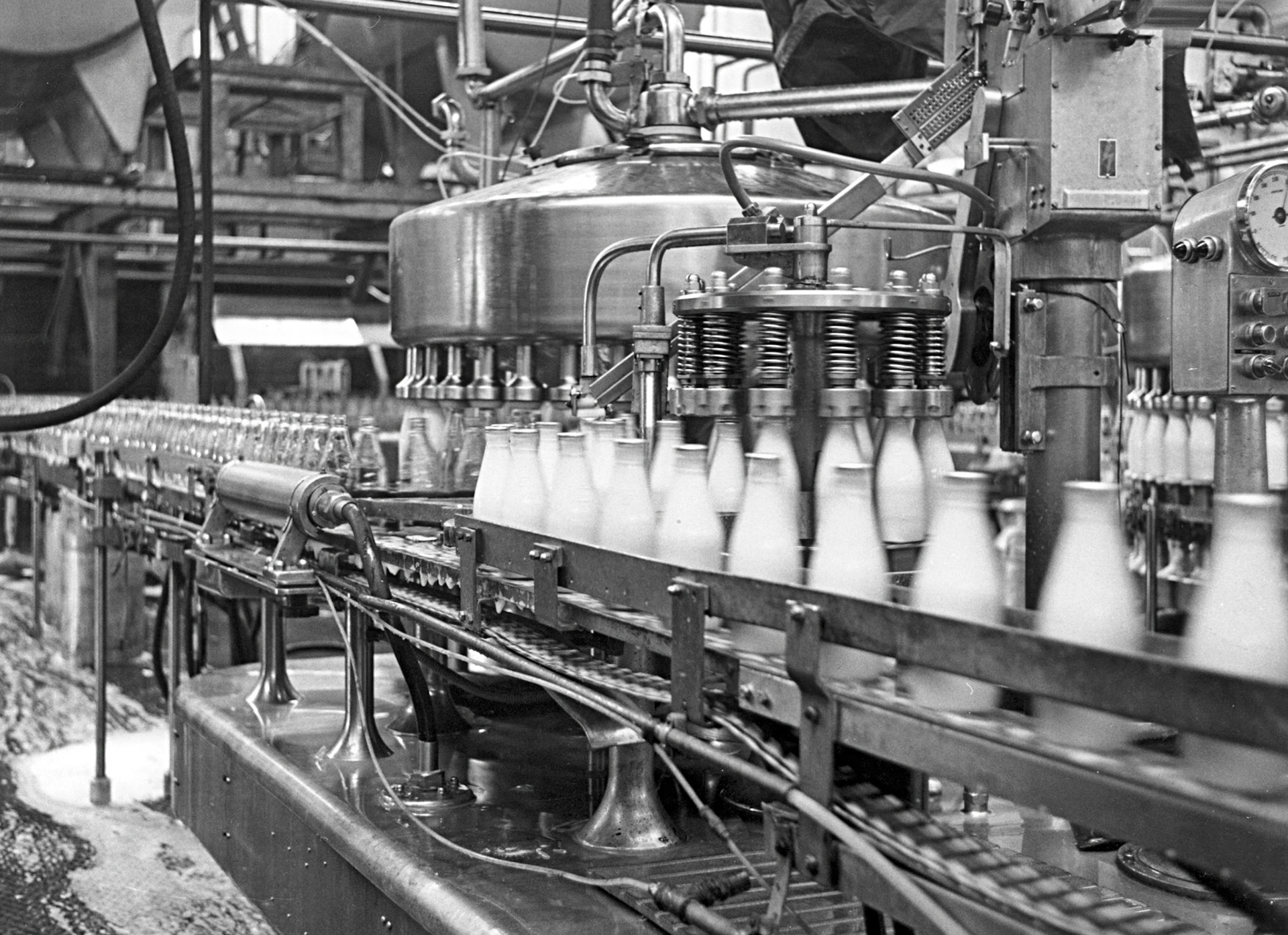 1970's Dawson bottle filllers, before the changeover to 'pintie' bottles