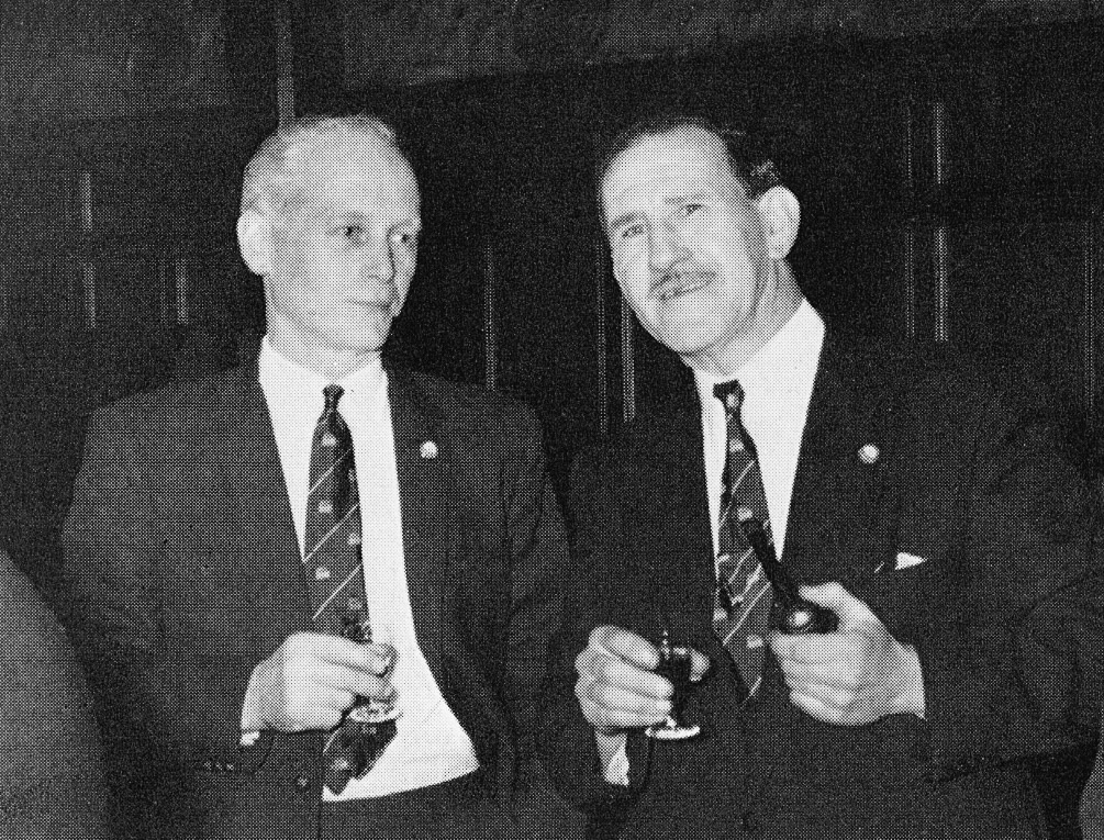 1966 Shrewsbury Long Service Dinner. 'Cheese Experts Bob Carline and Jack Coppenhall, who worked at Ruyton and Whittington as Head Cheesemaker.'  Ron Iles comments "I remember Jack at North Tawton great man." Tim Schofield adds "I remember the very early days at North Tawton where Jack finished his career, basically put out to grass. He still smoked his pipe and spent most of his time tinkering with his Ford Cortina. A good man all the same!" Bruce Macdonald remembers "Eddie Behan, my cheese grading manager and mentor, often spoke with great reverence about Jack Coppenhall." (Express News Summer 1966)