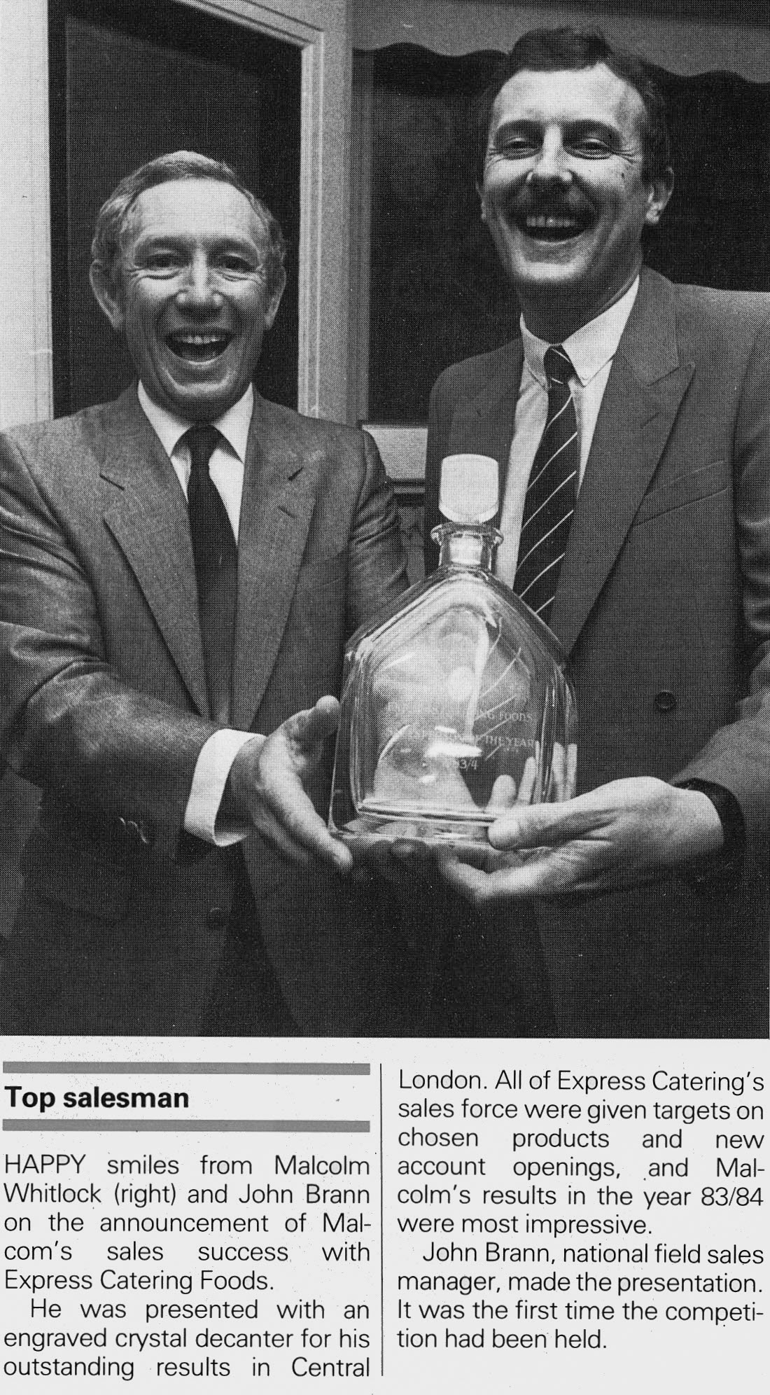 1984 Malcolm Whitlock wins award as Express Catering Foods top salesman, pictured with John Brann, National Field Sales Manager. (Express News Winter)
