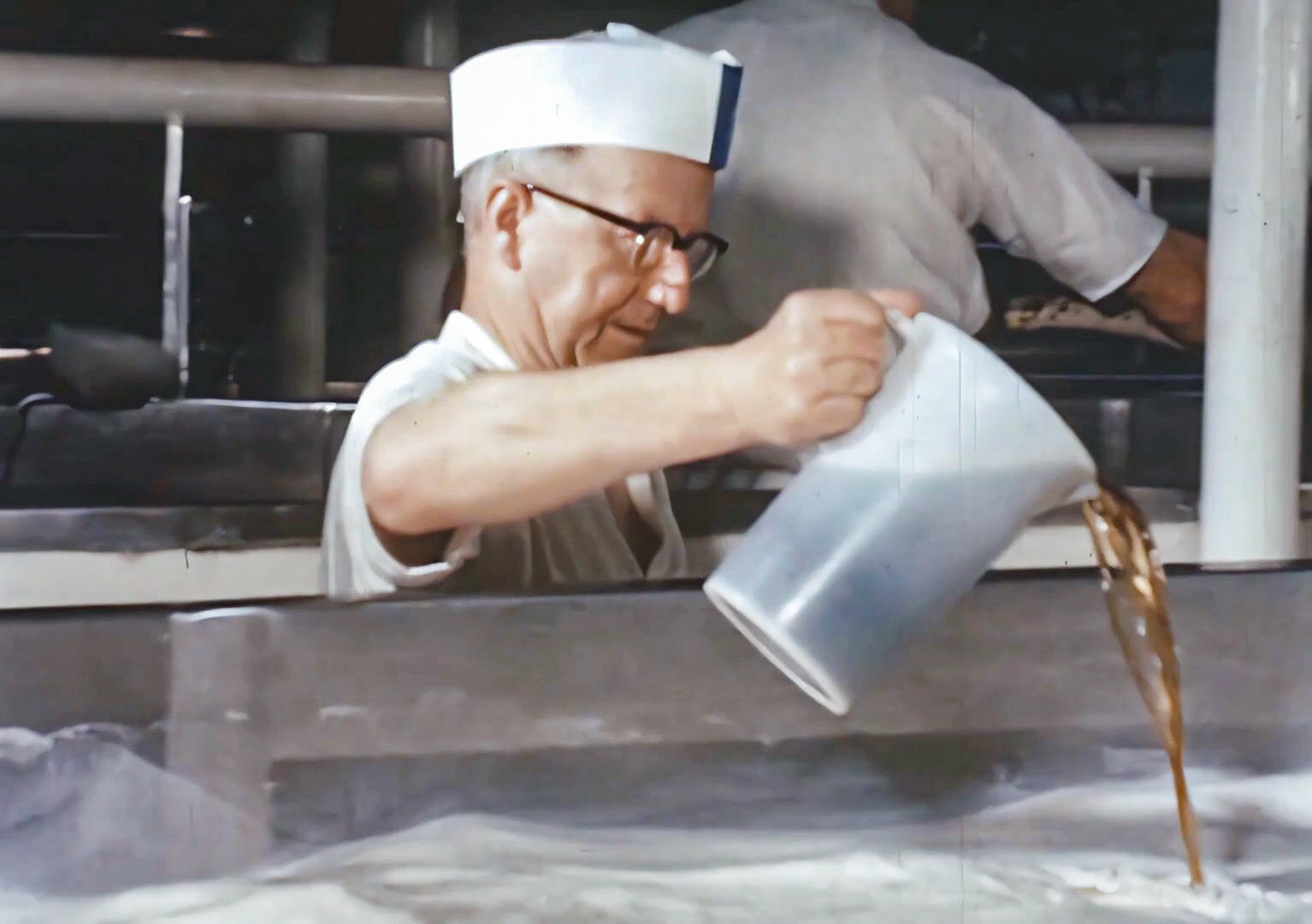 (Still from 'The Art of English Cheesemaking' video)