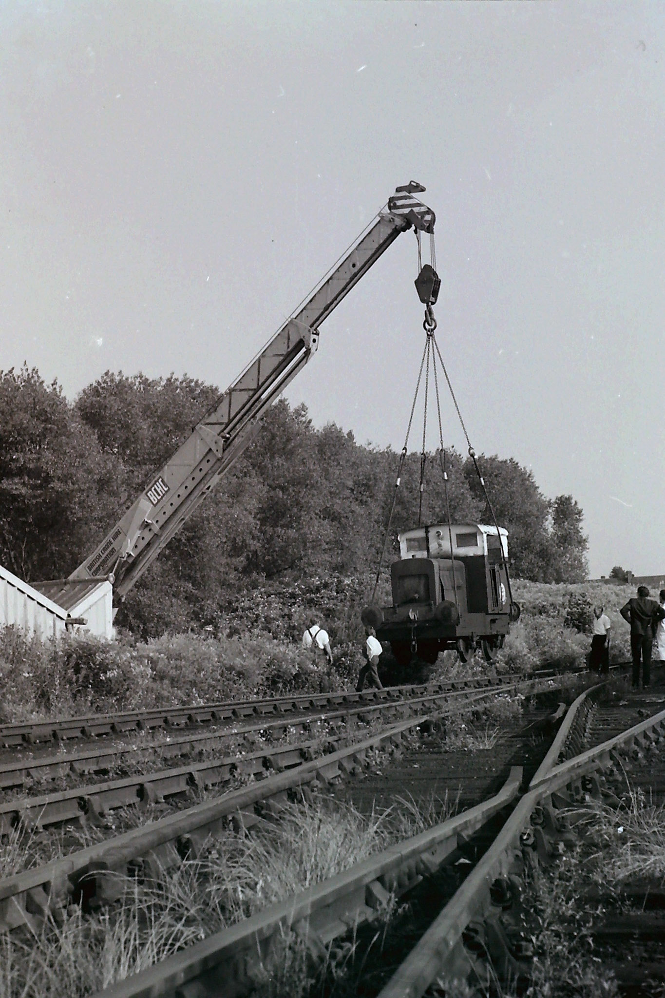 1972 Ruston 48DS 235511 being lifted out by crane into the car park on 26th July to be taken by road to the Ashford Steam Centre. Possibly Brian Wallis, plant engineer, directing the crane in white shirt?  Raffaele Ralph Phillips comments "This shunter was in use when I joined the company in 1970-as an apprentice vehicle electrician I had to check the batteries and some basic electric circuits whilst in service, also checking the charging system on the shunter which involved starting her up! (Picture by Sam Jones, courtesy Geoff Smith)