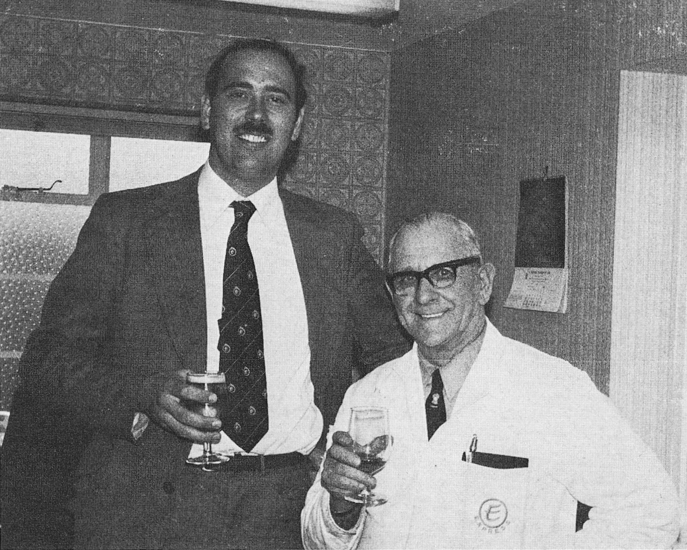 1979 Ernie Lamb retires from Tarvin Dairy after 30 years, with manager Ian Hague.