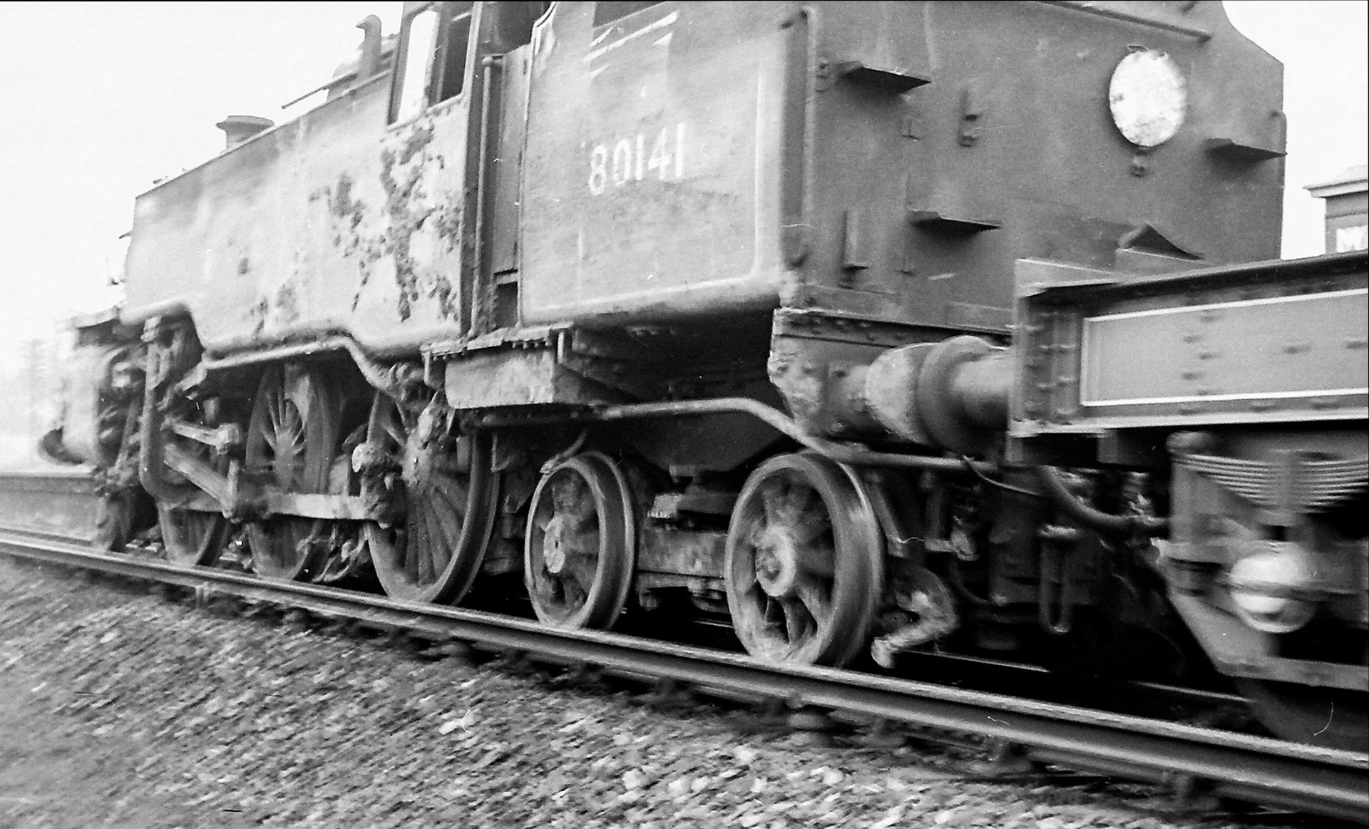 1966 80141 re-railed. Southern Railway Email Group explains "BR Standard Class 4 Tank. 155 of this class of locomotives were built in Brighton, Derby and Doncaster works between 1951 and 1957 and became general workhorses on all the regions of British Railways, except the Western. Not things of beauty with their somewhat unattractive "rear ends", they were a product of the development by British Railways of a series of twelve "Standard" locomotive designs embracing the best practices of the pre-nationalisation railways. Designed by RA Riddles, British Railways' Chief Mechanical Engineer, these tanks were one of the most successful of the "Standards", doing well all that was asked of them." (Photographer Sam Jones)