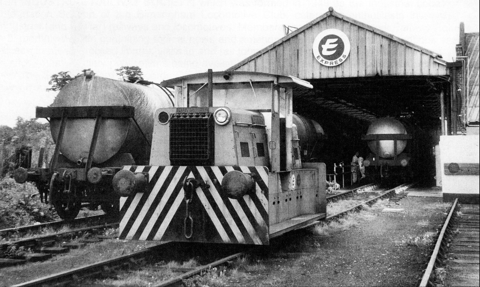1974 "Hunslet 5308 stands outside the discharging shed; note the aluminium painted rails inside" (from 'South Morden Dairy' article by Sydney A. Leleux in the Industrial Railway Record, Edition 210, September 2012)