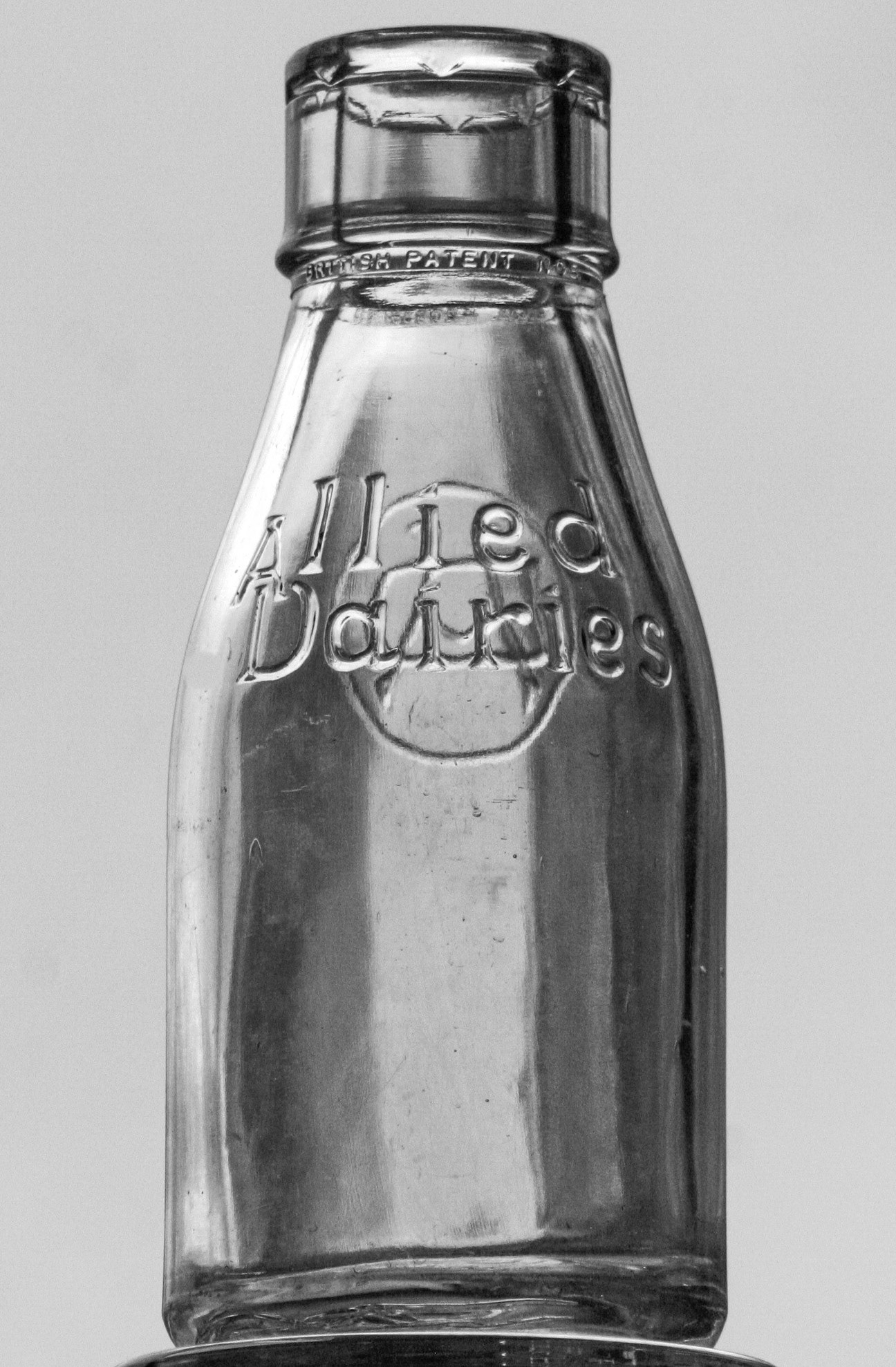 1940s Allied Dairies half-pint milk bottle, sealed with a foil cap closure.(Courtesy Mark Hudson)
