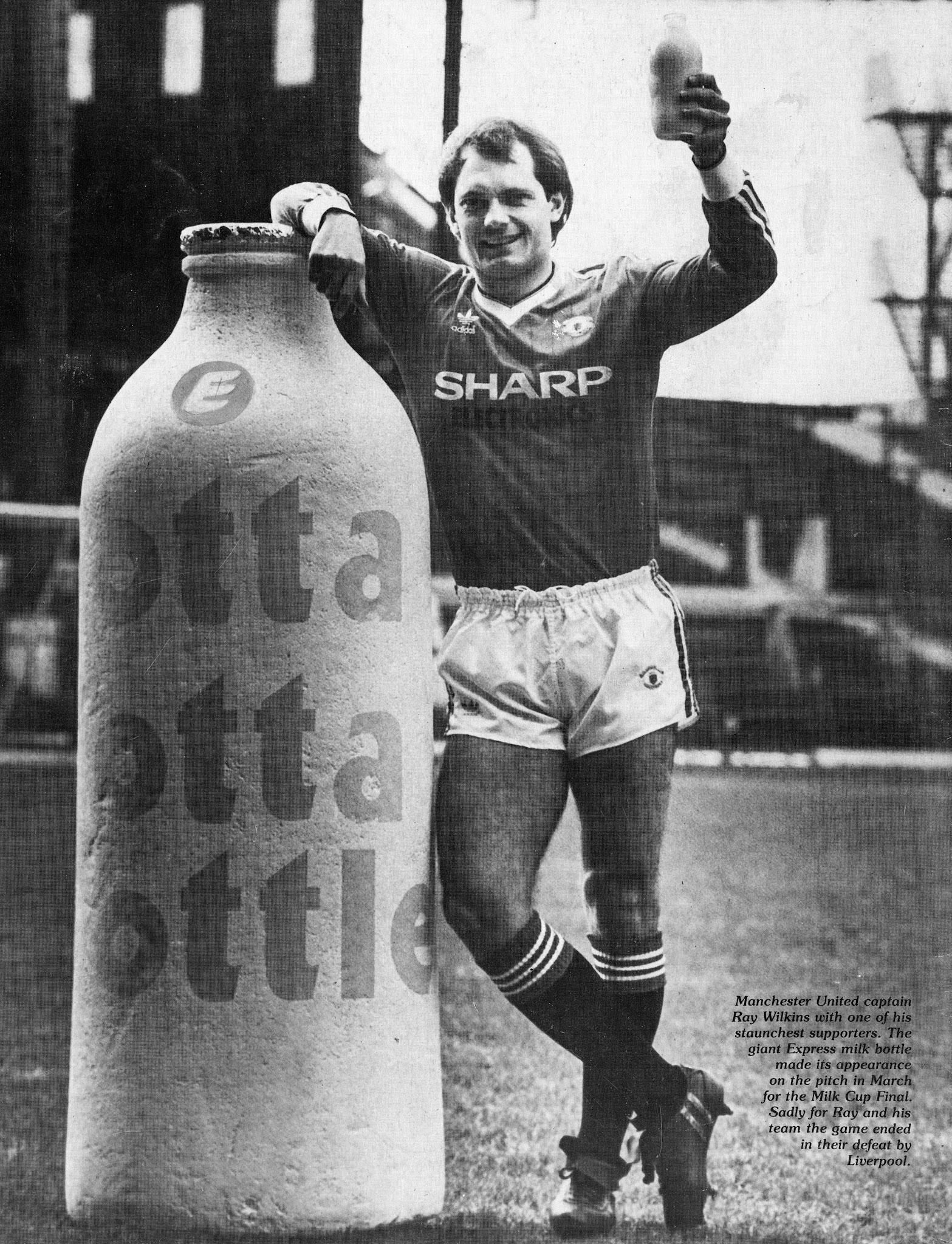 1983 Manchester United captain Ray Wilkins with one of his staunchest supporters, in March for the Milk Cup Final. Sadly the team lost to Liverpool.