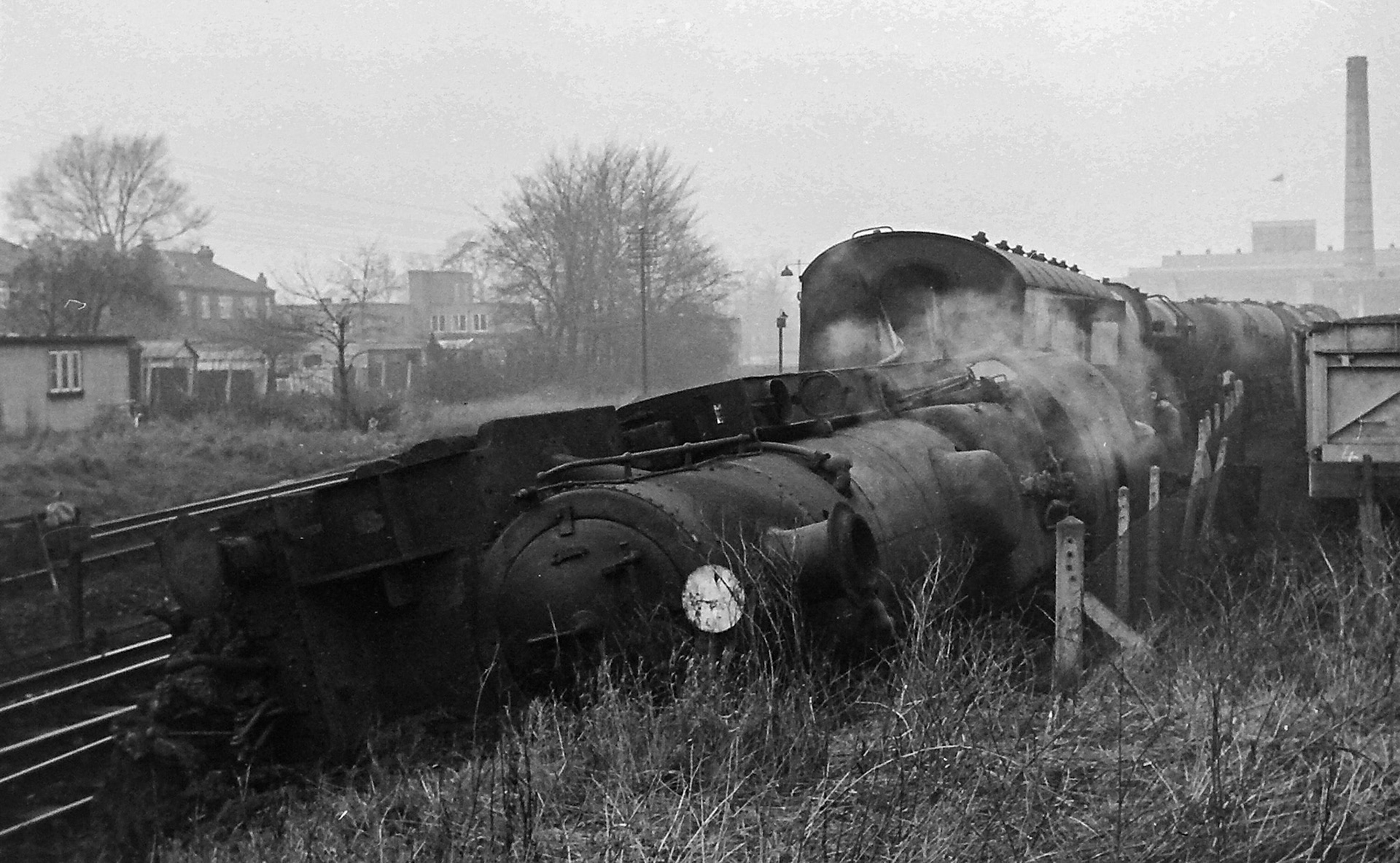 1966 South Morden. BR Standard Class 4 Tank 80141 jumped the points with a load of empty tanks, closing the line and siding for 48 hours. (Photographer Sam Jones)