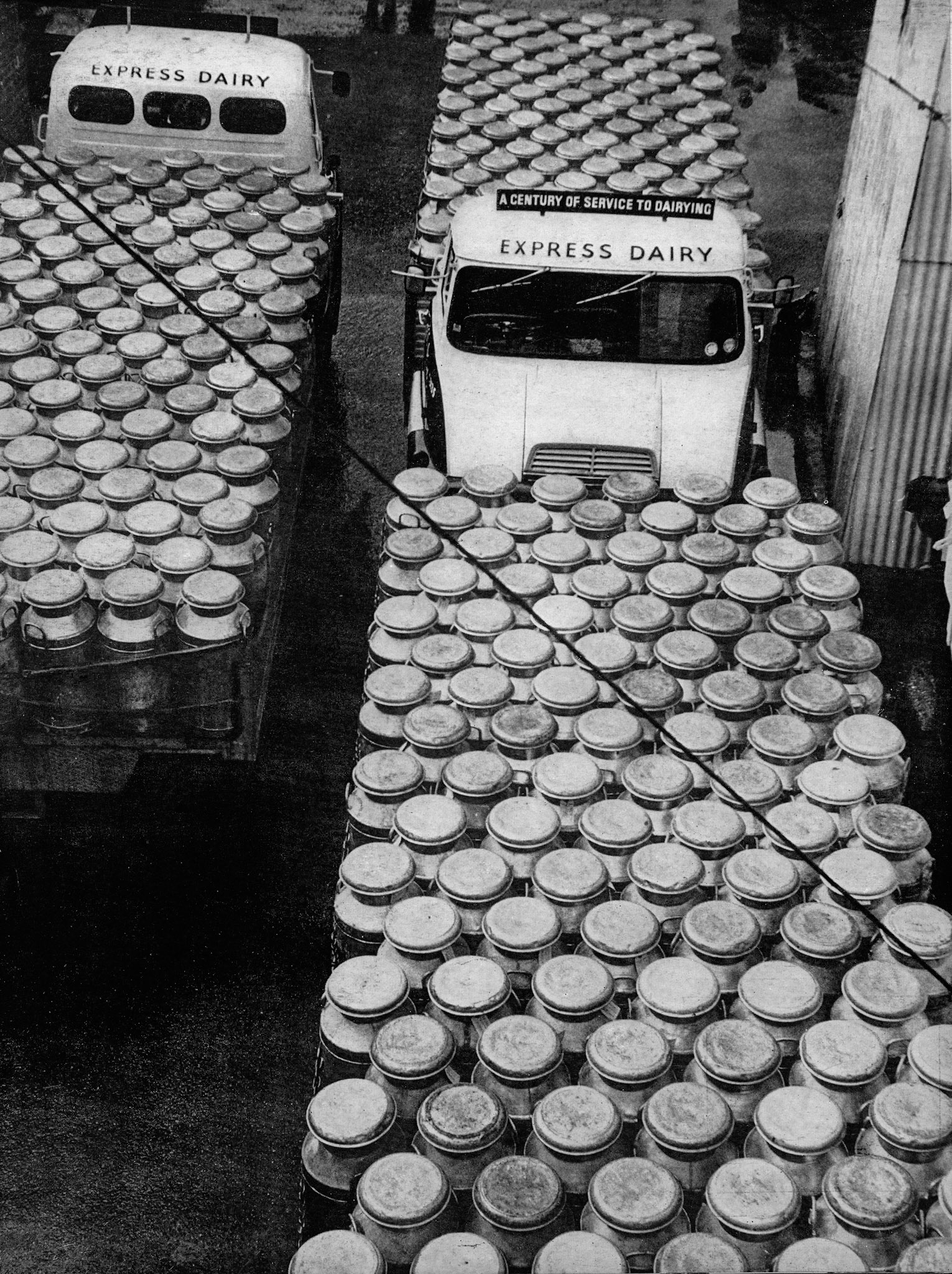 1965 "A bird's-eye view of incoming churns at Seaton Junction." Express News Summer/Autumn Back Cover