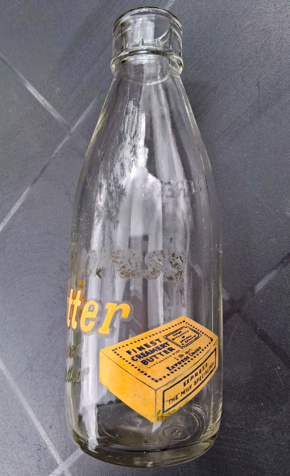 1950s? Interesting Express pint bottle with enamelled butter advertisement. (Courtesy eBay apbr20)