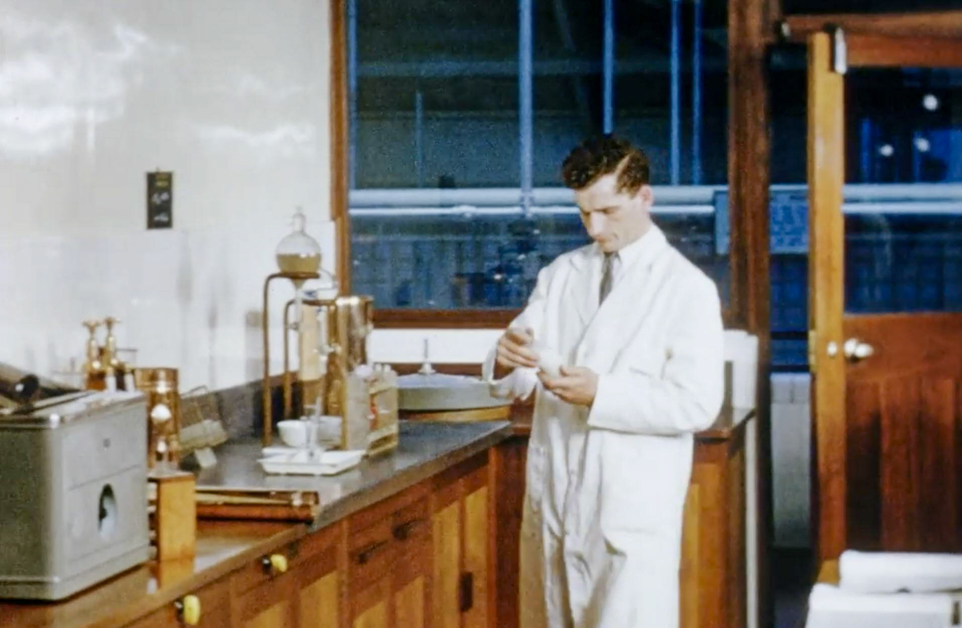 1954 South Morden Processing Laboratory, on the mezzanine floor overlooking the bottling line, and next to the visitors' room and demonstration kitchen. (Stills from Express Dairy Film)