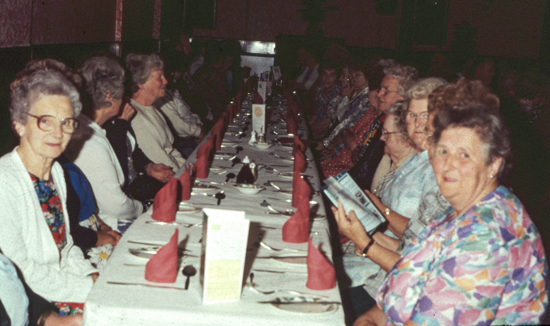 1995 Minsterley Social Events. Ben Samuels identifies Connie Luther on the right, at the front, and Winnie Carswell opposite her and Doreen Williams with the glasses third from the front on the right. Gemma Cowlishaw comments "Lovely, Winnie was my nan". Ben Samuels added "I worked with your Nan for a while in the Hard Cheese department. She lived opposite my mum in Orchard Drive, Minsterley."  (Joe Lyons 35mm slides)