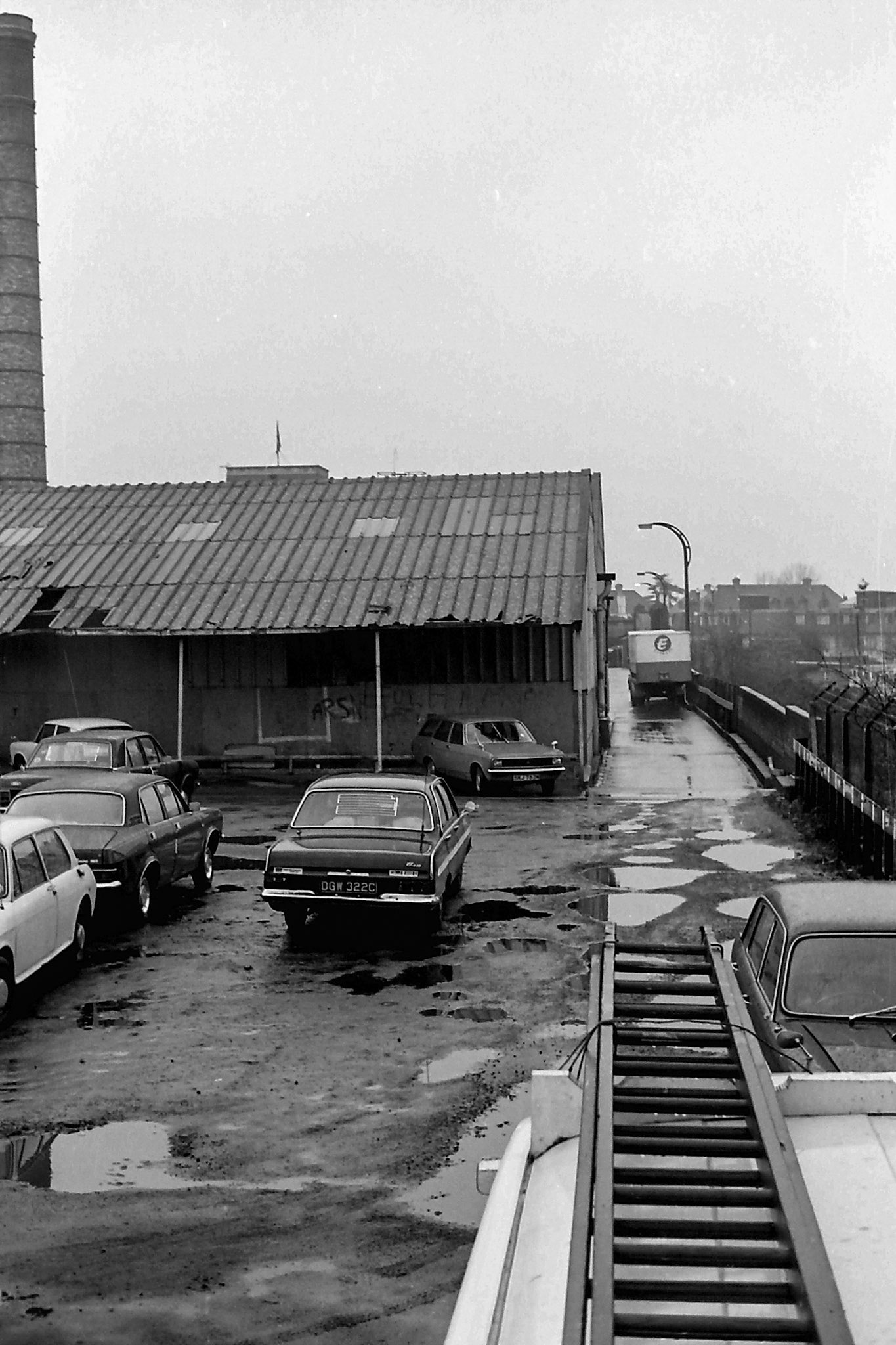 1979 rear car park and old forklife charging lean-to during the re-equip project. (Photographer Sam Jones)