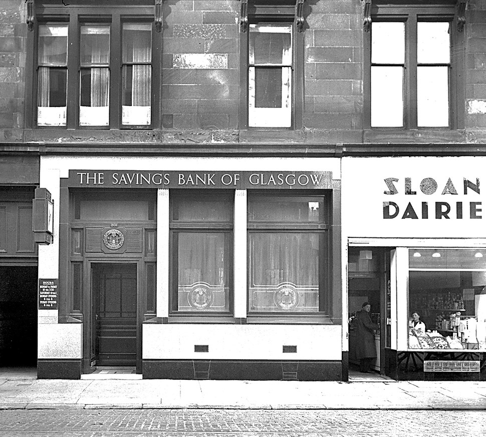 1940 Sloan's Dairies shop, 203 Byres Road, Glasgow. Kathrine Gemmell comments "My mum worked in Sloan's Dairies", Alex Whitelaw adds "My first job in 1972 as van boy with Bowie Castle bank laundry. I used to get a gingerbread square and 1/2 pint of milk for my break at Sloan's Dairies." (Courtesy Glasgow City Archives ref: D-CA8/493)