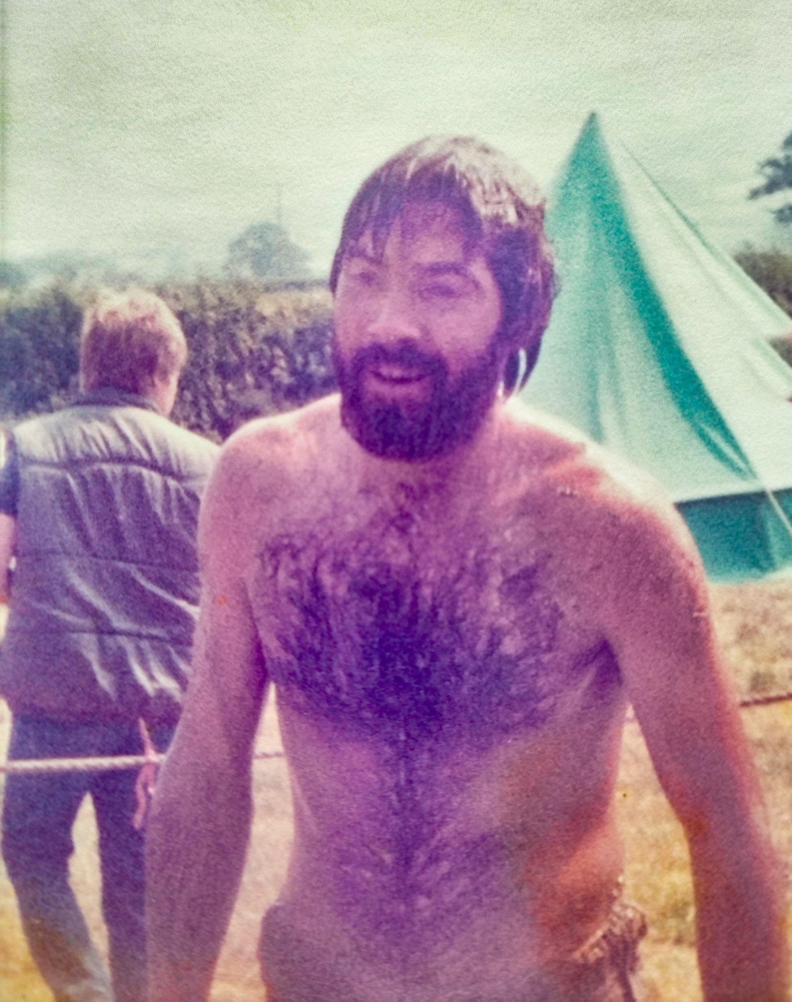 1985 Tim Pearce from Honiton at the East Devon Mud Games tournament... being hosed down after the event. (Courtesy Tim Pearce)