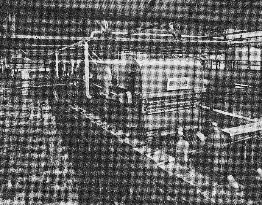 1930's Cricklewood-Bottle Washing Machine, ejecting. 'A peep behind the scenes of the Express Dairy, Claremont Road, Cricklewood - The largest dairy in Great Britain' (From 'While London Sleeps' booklet.