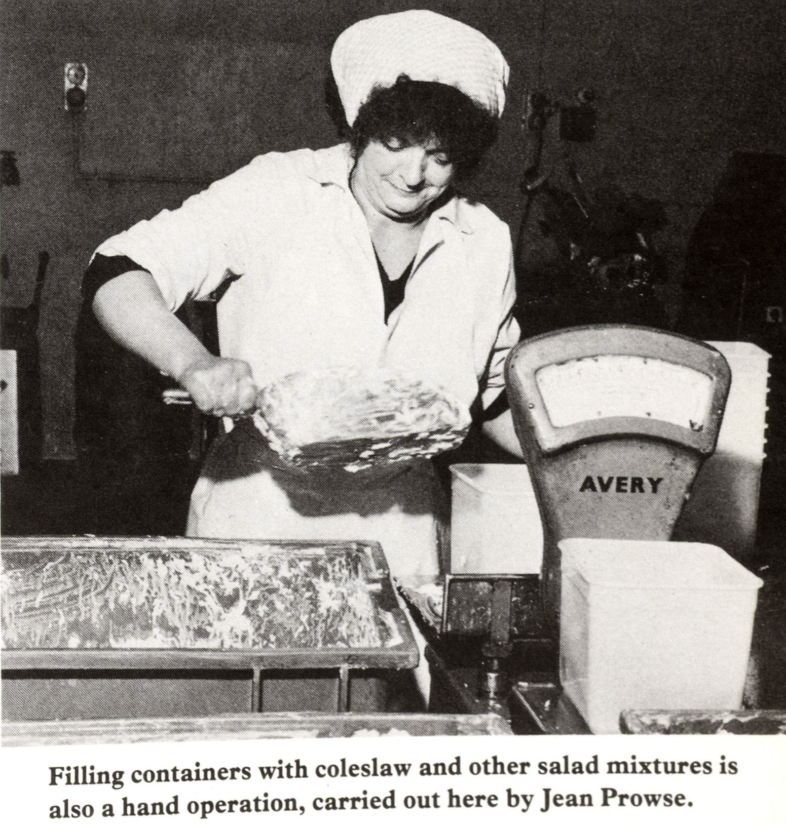 1979 Jean Prowse filling coleslaw containers at Littleglade. (Express News Autumn)