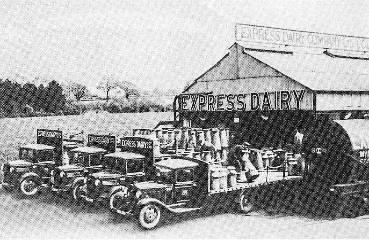 1930's Billingshurst Creamery. Caption reads "In the 1930s cooling stations were erected near many country railway stations. Here a line up of Bedford collection lorries delivers to such a station on the Southern Railway in Sussex. In 1935 the Express Dairy fleet numbered 302 vehicles." Chris Austen comments "I spent a few weeks at Billingshurst in 1959; Derek Gray was the manager. Ex-farm milk was cooled using a brine cooler; one had to be very careful not to freeze the product - otherwise it would come cascading out of the cooling system!" (Courtesy Dave Fane)