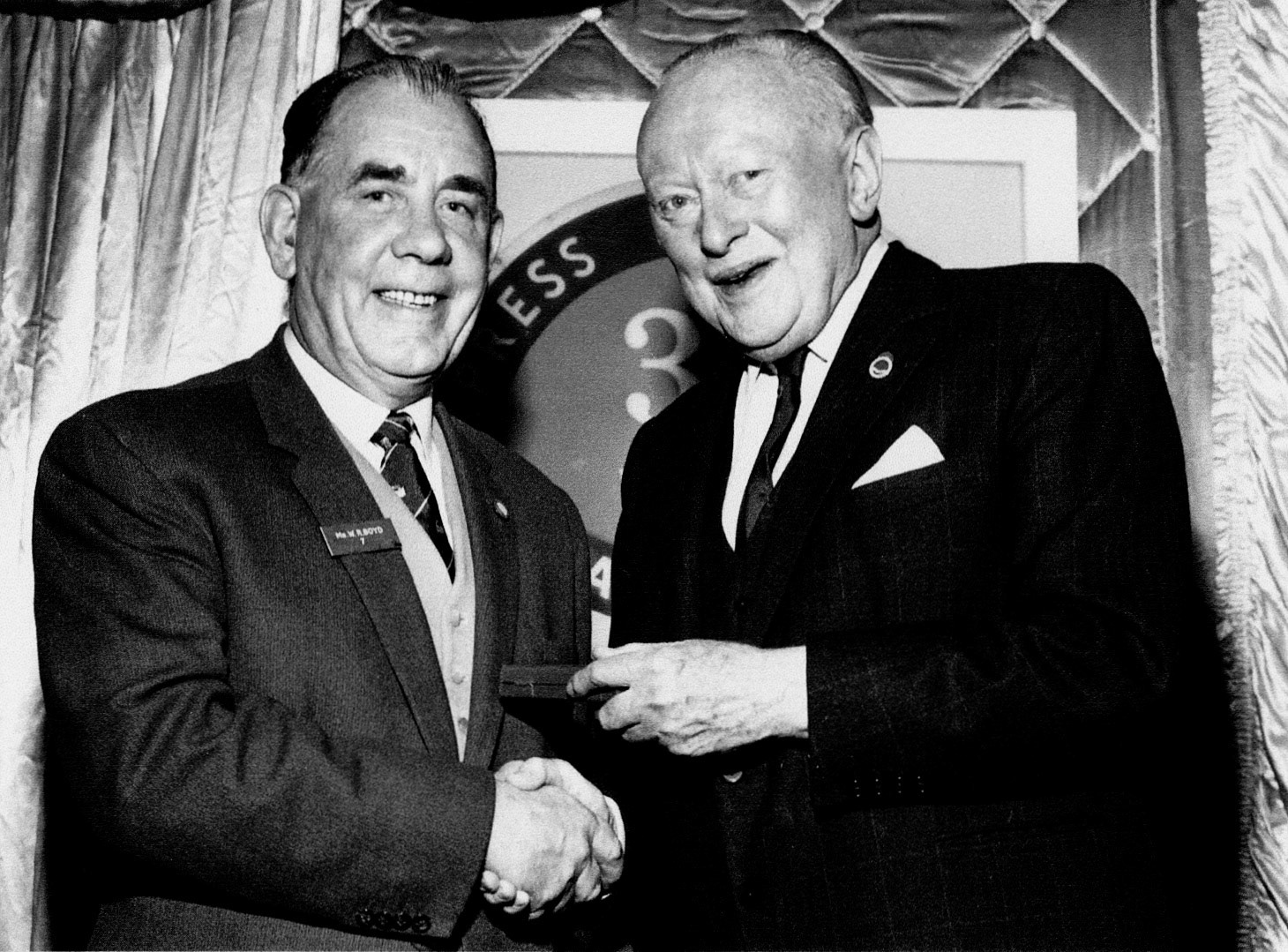 1970 Bill Boyd receiving his gold watch as 30 year award from Walter Nell. Phil Boyd comments "My Dad was a bottling hall foreman, he worked at Cricklewood, South Morden, College Farm, Brentford and Ruislip. We lived in Claremont road opposite the dairy"  (Courtesy Phil Boyd)