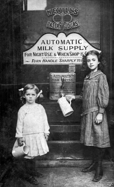 1911 Mechanical Cow - early vending machine installed in Ilford Essex. Jugs of milk could be filled for one old penny. (Courtesy Mary Evans Picture Library)