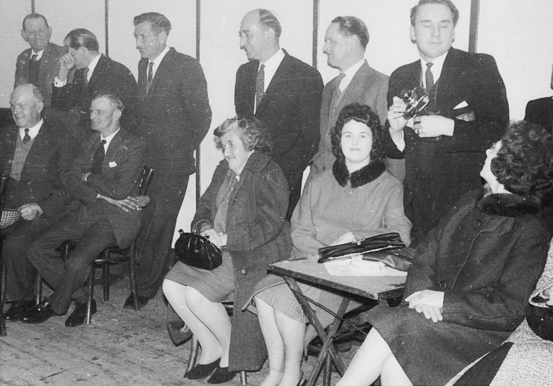 1953 "Doreen Ball, Linda Swain, Charliz?, ? Hills, Bill Childs, Dave Cullis, Dick Bells, Louise Pidwell". Phil Ruff comments "I remember Linda ladling out the milk allowance." Lorraine Fletcher says "Gosh there’s Linda, she lived up the road from us and used to baby sit." Debbie Llewellyn adds "I remember the milk having to be boiled before we could use it." Debbie Llewellyn The milk jug :)) (Joe Lyons Collection)