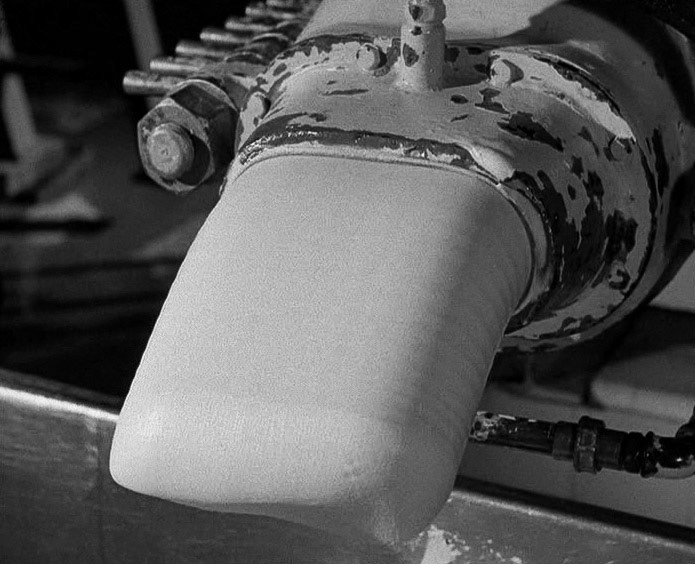 1940's Tower Creameries, later Mitcham Foods, part of Express. Kneading and extruding. (Courtesy British Instructional Films, British Pathé)
