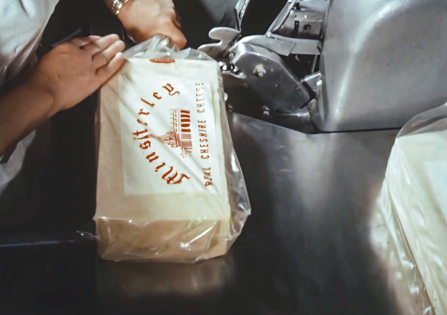 1960s Minsterley Cheese Packing. (Still from 'The Art of English Cheesemaking' video)