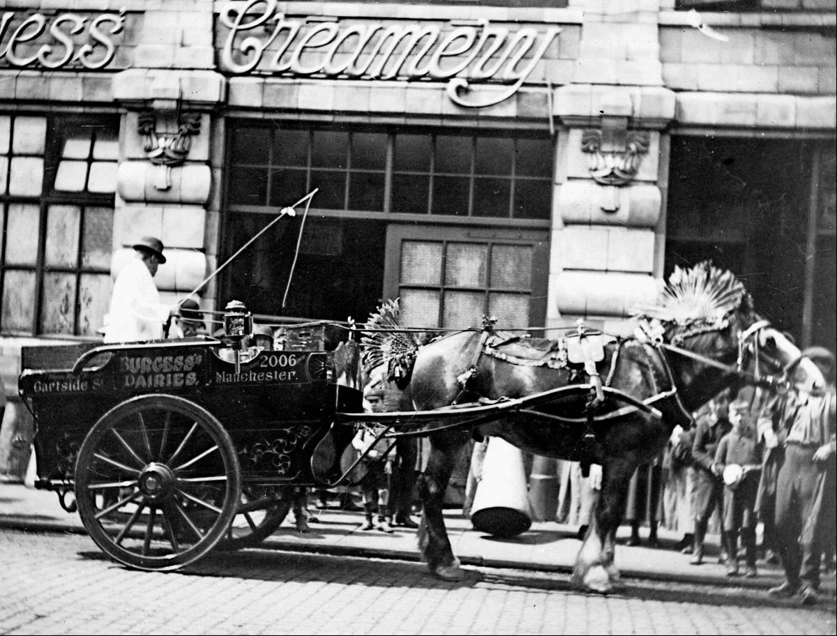 1926 Burgess Creamery, exterior showing milkmen and cart, Gartside Street, Manchester (Image courtesy of Manchester Libraries)