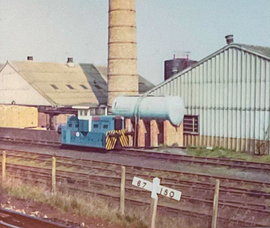 John Failes comments "I took this photo from a passing train during the 70’s, of a much photographed loco standing in the exchange sidings." Christopher Townsley identifies it as a Hunslet Yardmaster, DAVID (HE5308/60).From the Industrial Locomotive Enthusiasts Page FB Group.
