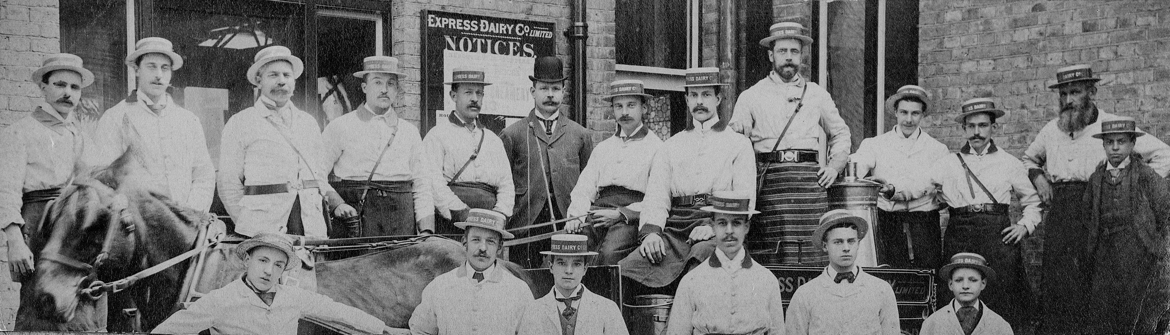 1900s Group of milkmen in straw boaters, likely to be at Tavistock place. (Courtesy Paul Smith)