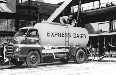 1960's Bulk Tanker unloading. Matthew Pinto comments "You can just make out a rail tank in the siding behind." (Courtesy Richard Gaylard)