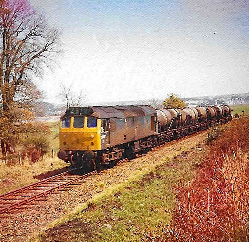 1960s? Empty milk tanks, at Penhill, near Fremington, North Devon. Jonathan Sanger comments "The milk tank is clearly before 1974 when the diesels still carried their old numbers." (Courtesy Ken Baker)