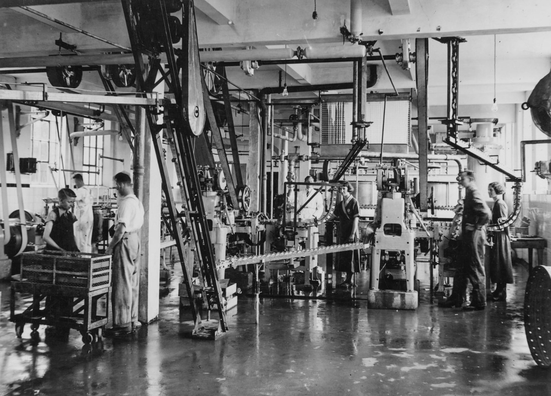 1930s Maisie Preston far right working at the creamery, on a packing line.. Wife of Richard Preston, Minsterley Creameries Chief Clerk at this time. (Courtesy Lynn Fickenscher)