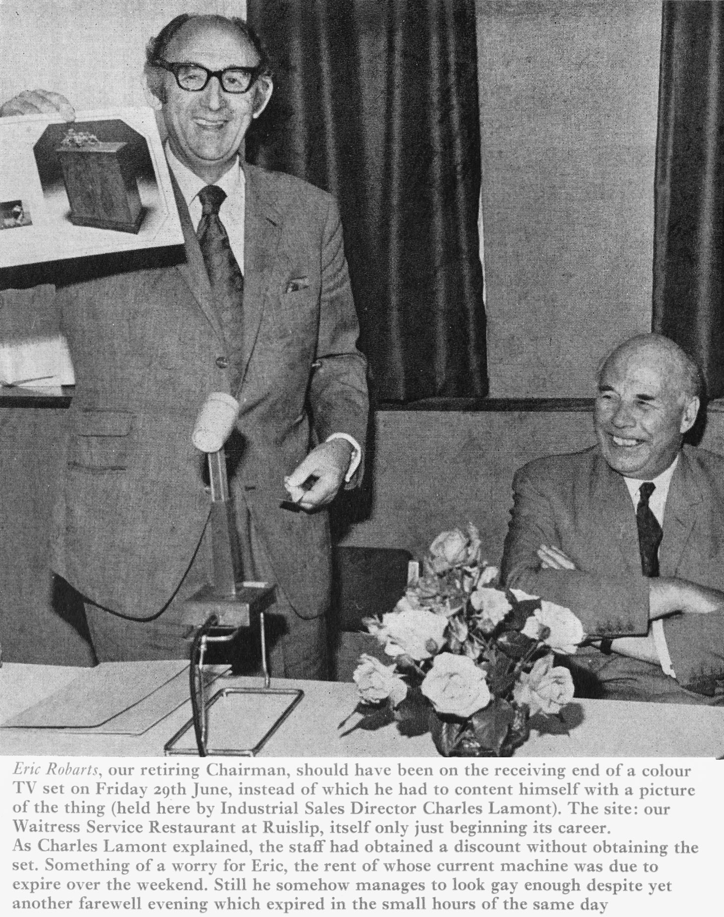 1973 Charles Lamont (Industrial Sales Director) presents Eric Robarts. (Express News Autumn)