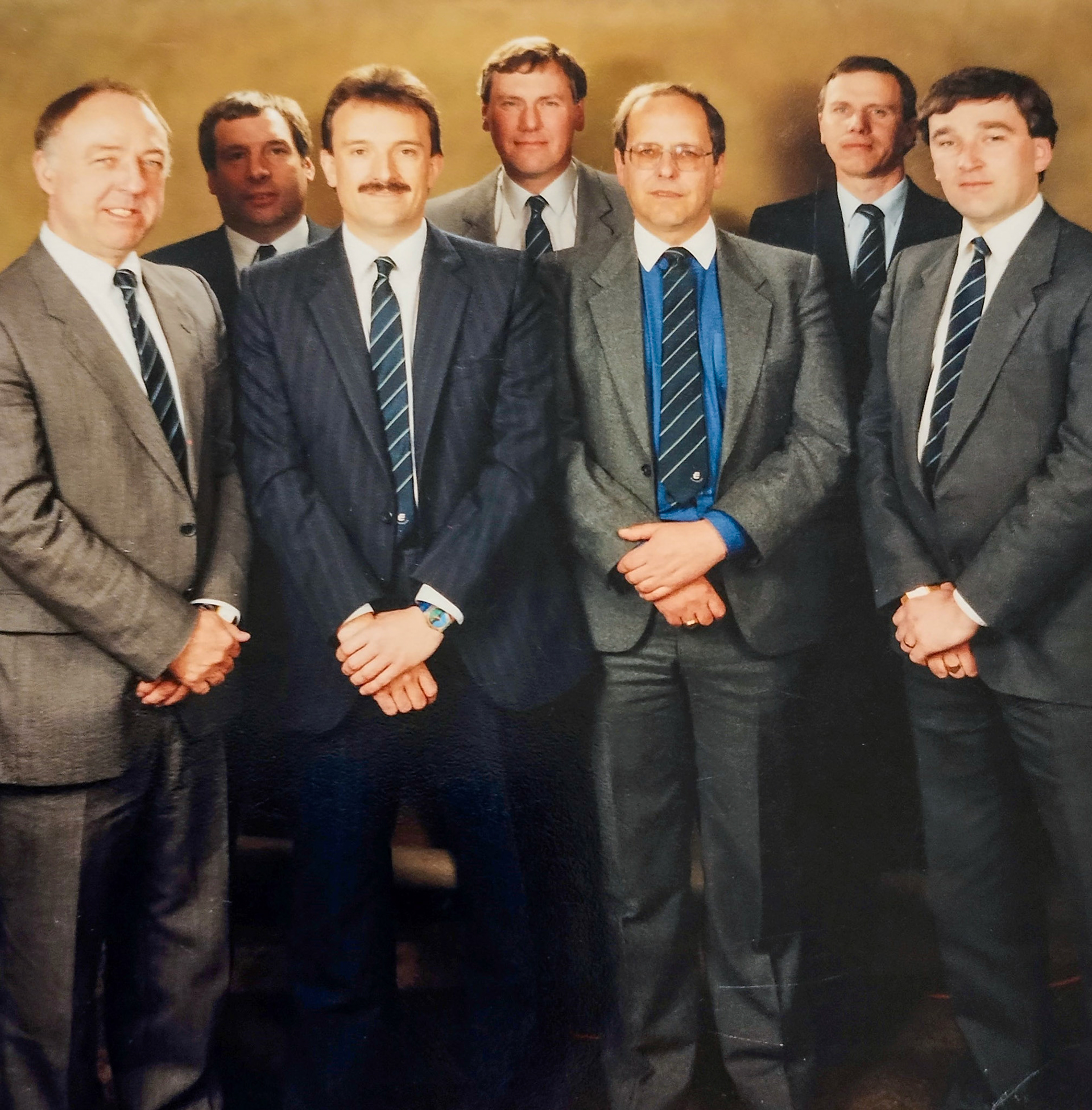 1990's National Sales Team, at South Ruislip. Front L-R: Tony Cunningham, Steve Hedges, Gordon Martin, Adrian Wilson, Back: Geoff Warby, George Chant, Roger Freer. (Courtesy Gordon Martin)