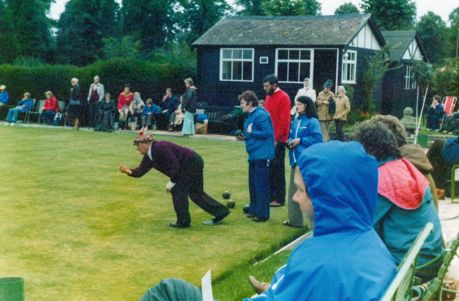 1980's Minsterley Bowling Club. Christine Fisher and Kevin Williams identify Evan Ingram 'leading out'. Liz Matthews and Ben Samuels recognise Marg Cartwright (behind him, long dark hair). (Courtesy Joe Lyons)