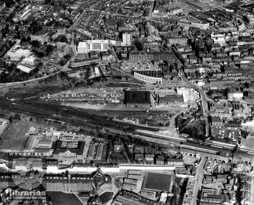 1967 Wakefield, Back Lane, Wakefield Prison bottom left. The Orangery and Westgate Chapel are further up Back Lane along with Drury Lane Library and Express Dairy. The Town Hall and County Hall are to the right above the lane. (Courtesy www.twixtaireandcalder.org.uk)