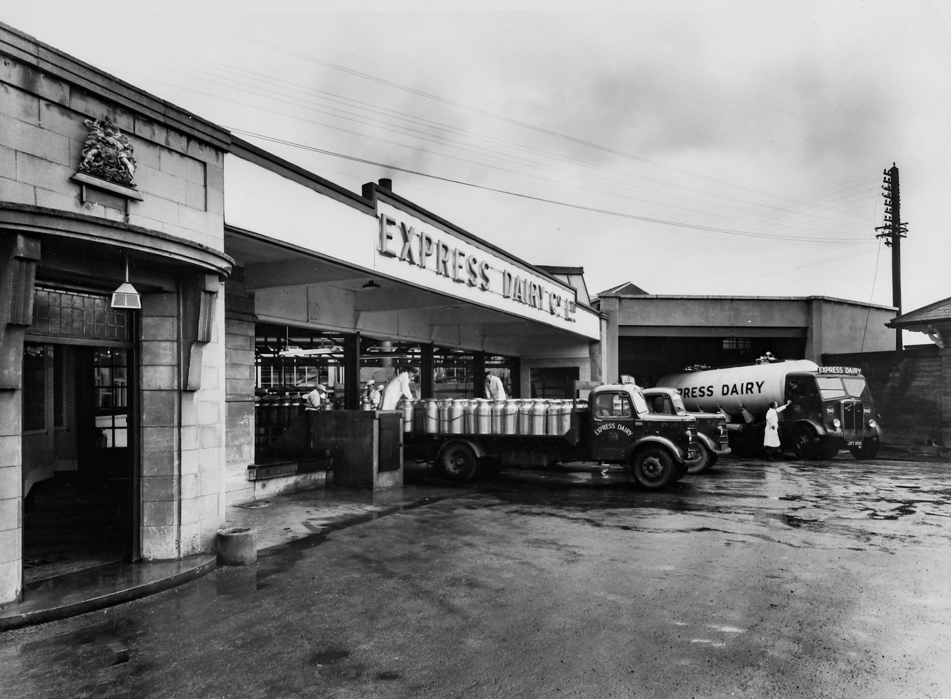 1950's Rowsley Dairy front entrance and churn bank. Co Nos: 981, 960. (Courtesy Derbyshire Record Office, donated in March 1985; they had previously belonged to the donor's father, who was an electrical engineer with the dairy.)