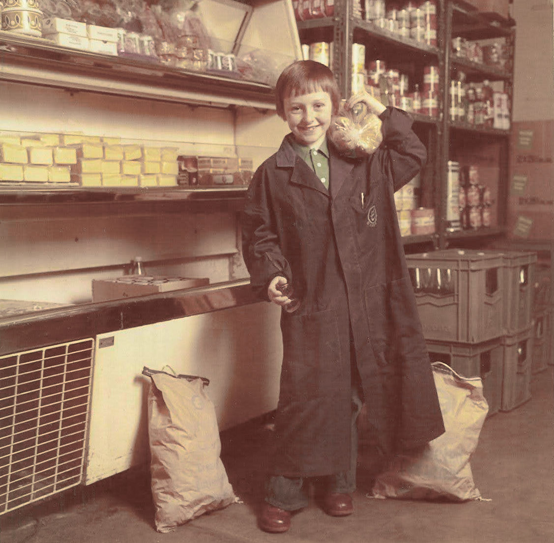 1977/8 Stevenage. Bob Sharman remembers "I was working in the servery when the first edition of an Express magazine was launched. I was asked by Head Office to be part of the photo shoot, which included my lads (who are now in their 50’s). Note the Corona crates in the corner, after we had taken over Corona soft drinks deliveries." (Courtesy Bob Sharman)