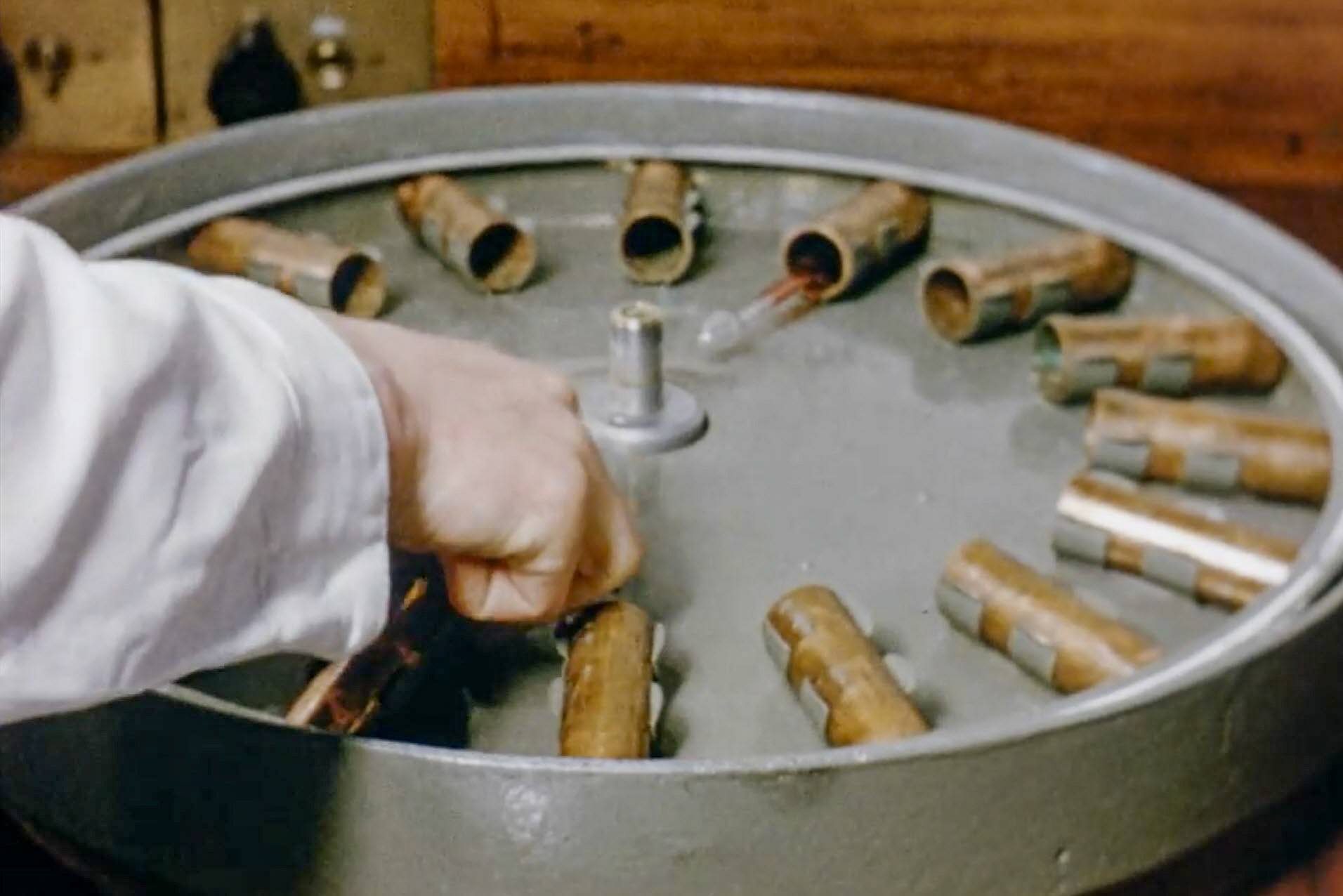 1954 South Morden Laboratory-spinning Gerber Test vials in the centrifuge. (Stills from Express Dairy Film)