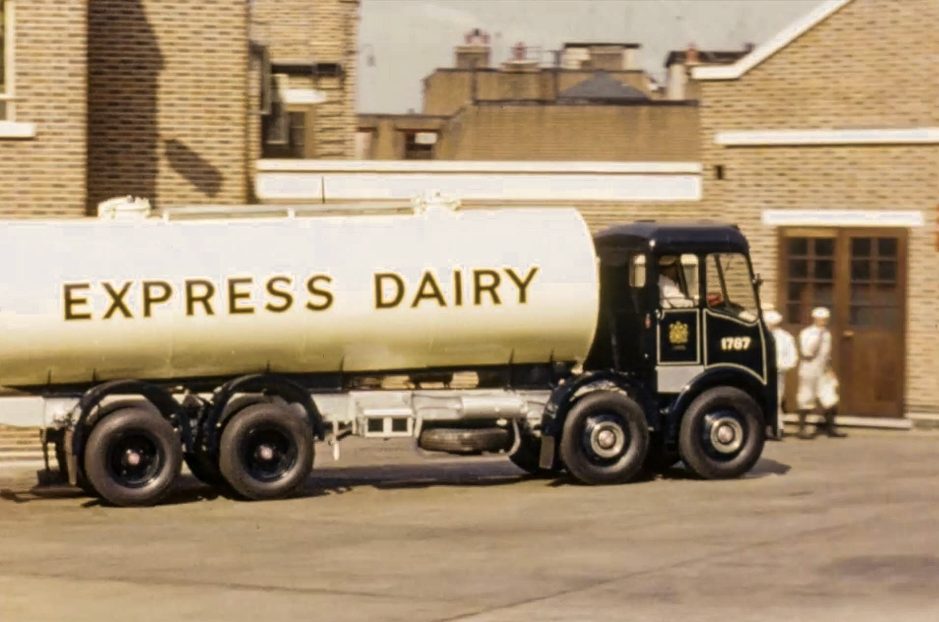 1954 Road tanker RLM 318, Fleet 1787 arriving at South Morden, from Billingshurst. Dairy Stores and borehole block in the background. (Stills from Express Dairy Film)