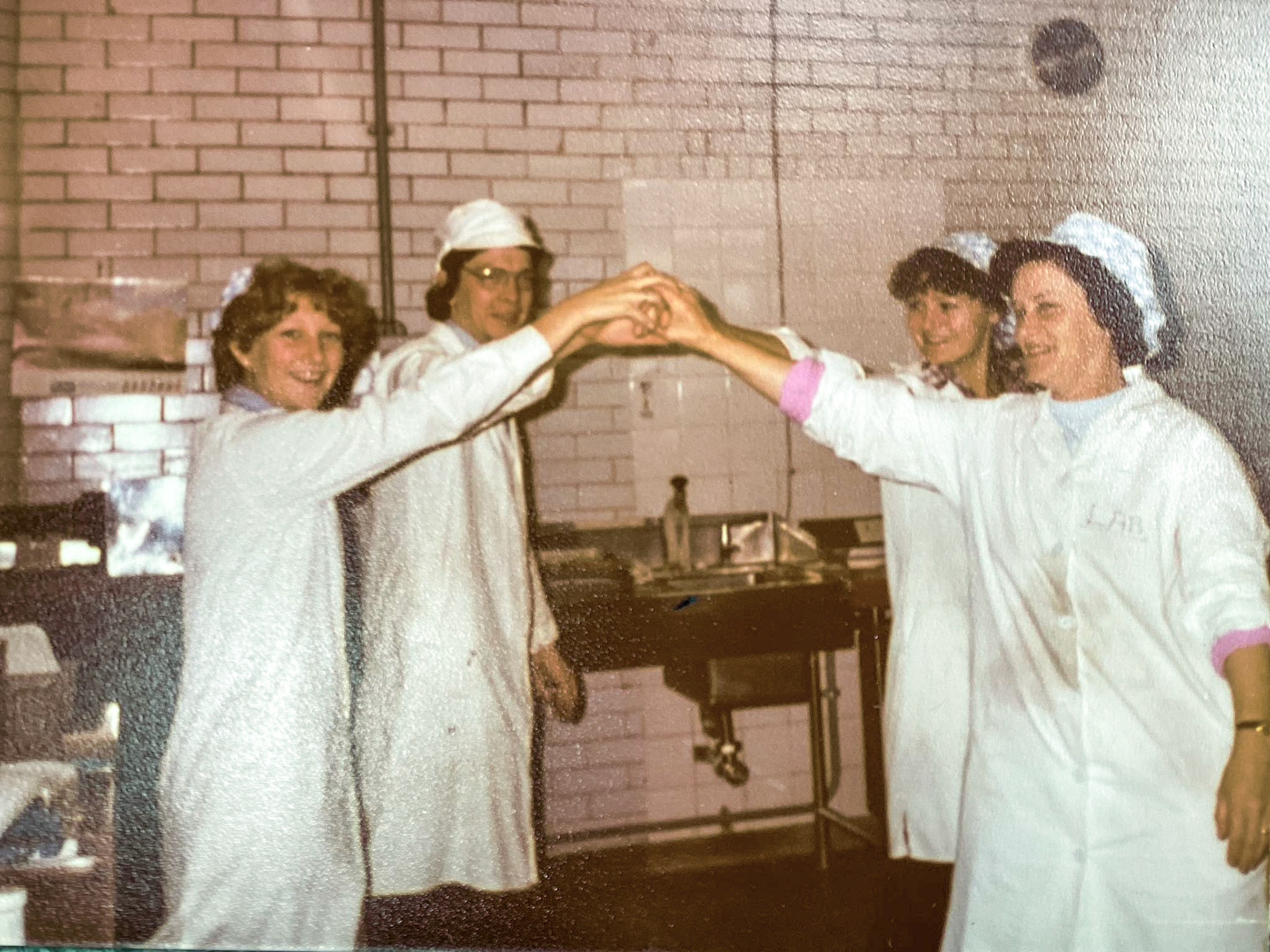 1979 Staplemead. Kate comments "A rare one including Arthur Priddle, not often caught on camera 🙂. I think you must have taken this Frank Dineen." Frank adds "Great shot if it was me haha, I'll take the credit. With Josie Cusmans in front on the right and yourself Kate Morrison behind and Heather Rusbridge on the left in front of Arthur Priddle. Those were the days when we had fun at work and worked together."(Courtesy Kate Morrison)