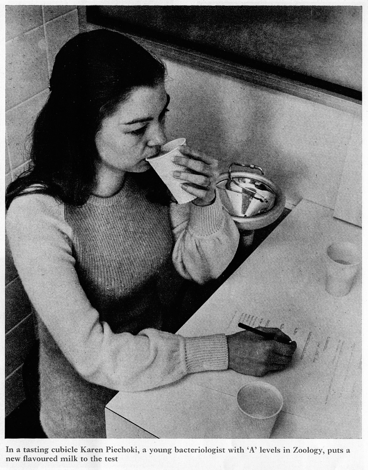 1973 Karen Piechoki in a tasting cubicle at South Ruislip, with flavoured milk