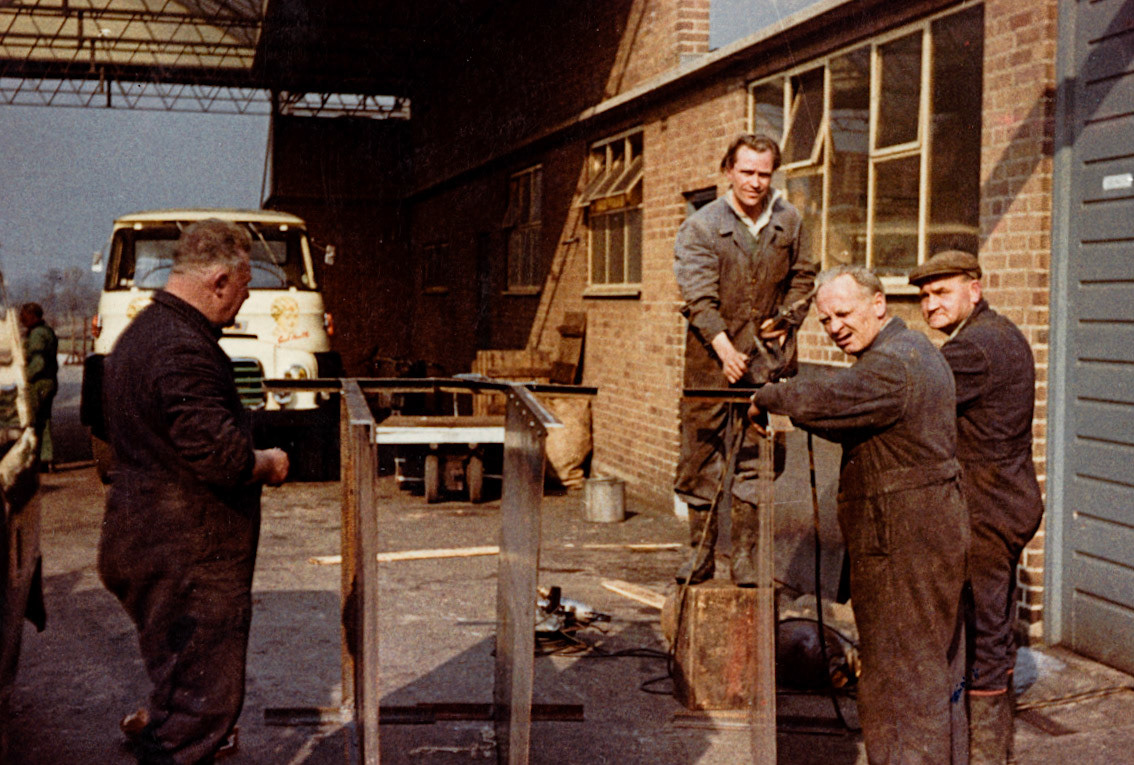 1960's? "Outside fitters-R Lakelin (L), Harold Betton, Dave Cullis, Arthur Britton" Lavinia Morgan comments "My Dad Rollie Lakelin❤️ on the far right. Dave Cullis standing over them. (Joe Lyons Collection)