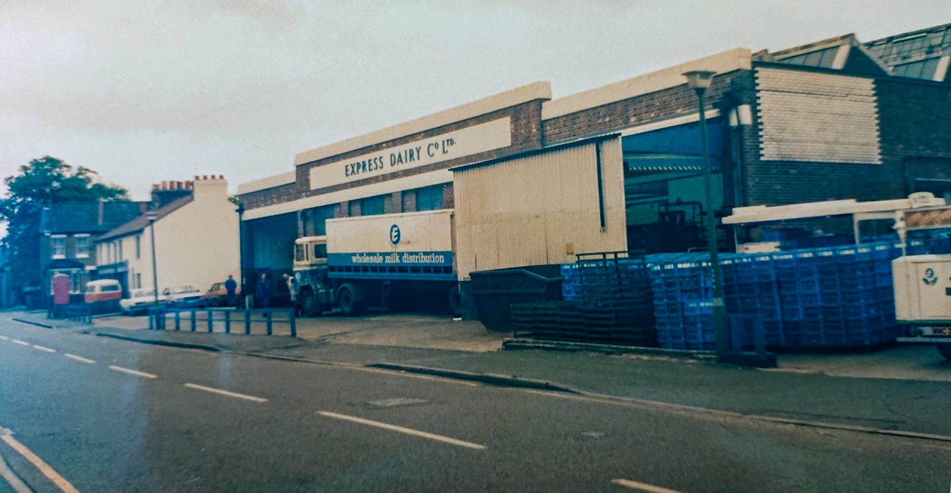 1980's Bromley Bottling Depot. Colin Bristow comments "Early 1980's, corner of College Road and Farwig Lane." Roger Frost adds "I used to go there on night shift to change vehicles over for servicing in the South Morden workshop the next day. I also towed a loaded tanker in there one night with ‘Big Bertha‘ the AEC Matador breakdown truck-so that the milk could be pumped out."  Raffaele Ralph Phillips comments "The motor engineer who repaired vehicles at Bromley, Sundridge Park and Elmer's End (Foods) depot was Alfie Gardener, a short chap known at the Morden garage as "Drag arse". If he had a job that required more help from Morden, we would be sent over to Bromley to assist; on arrival Alfie would suddenly "disappear" into the toilets, leaving the said fitter to finish the job off alone, so the common phrase for going to the toilet at Morden was known as "Just going for an Alfie" 🤣🤣...true story! When I joined Express, Alfie's son, Robin, was a trainee foreman, he eventually became a driver for Express Foods out of Elmer's End.(Courtesy Colin Bristow)