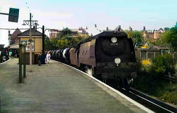 1960's Bulleid 'Spam Can' hauling the Plymouth to Morden South, Express Dairy milk train through Wimbledon Park Station. (Courtesy Robert Carroll/ Robin Beard)